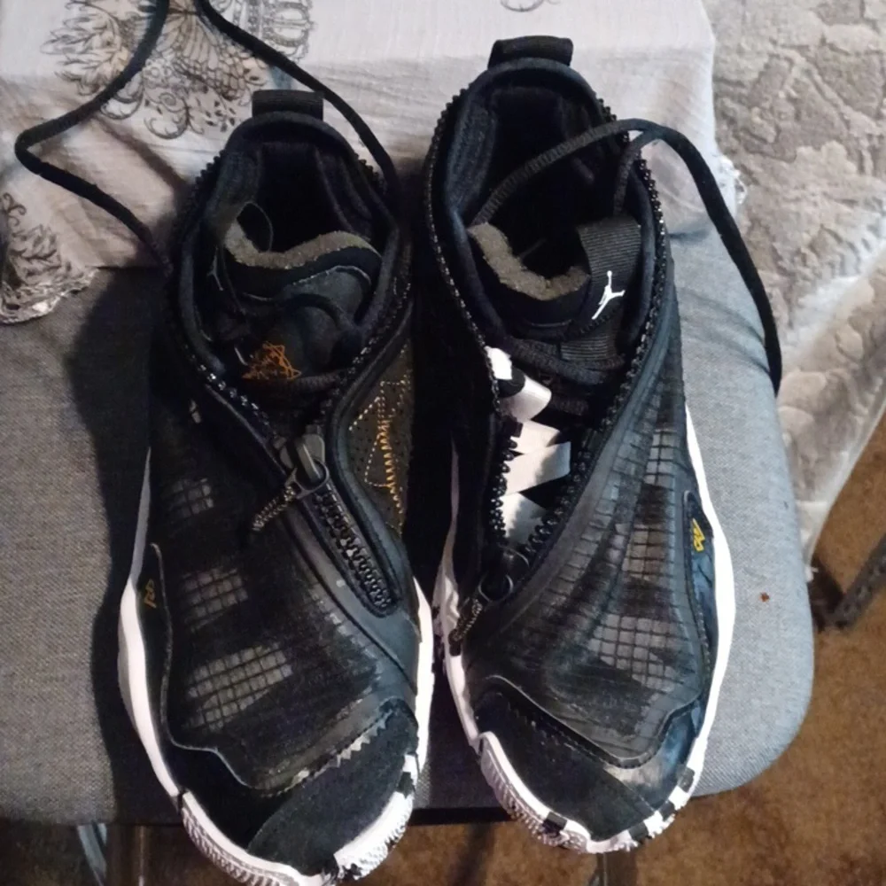 JORDAN Shoes Black and White Athletic Sneakers with Gold Accents - Picture 4 of 9